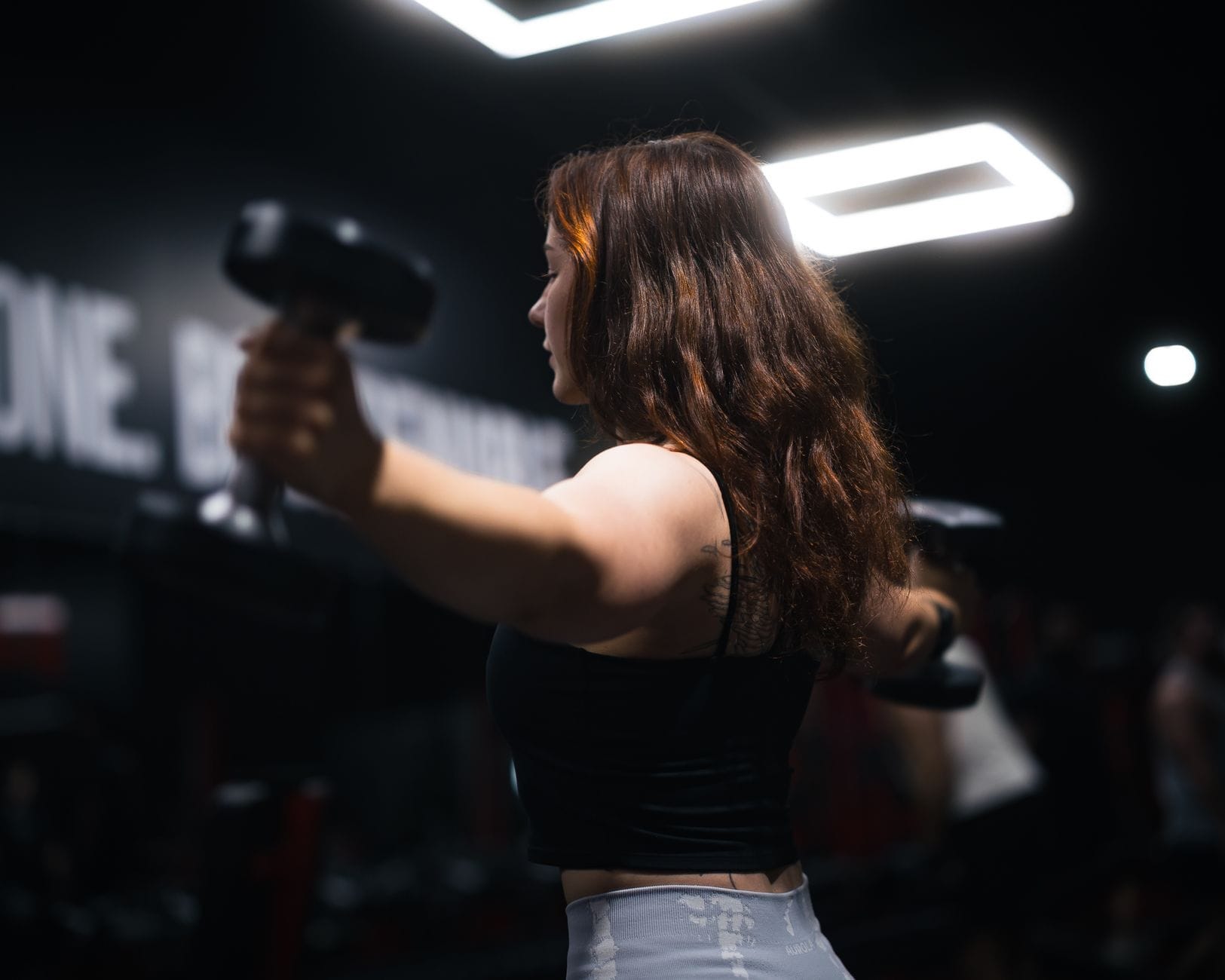 woman lifting weights