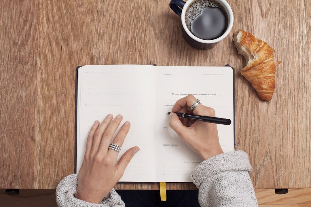 woman writing food journal