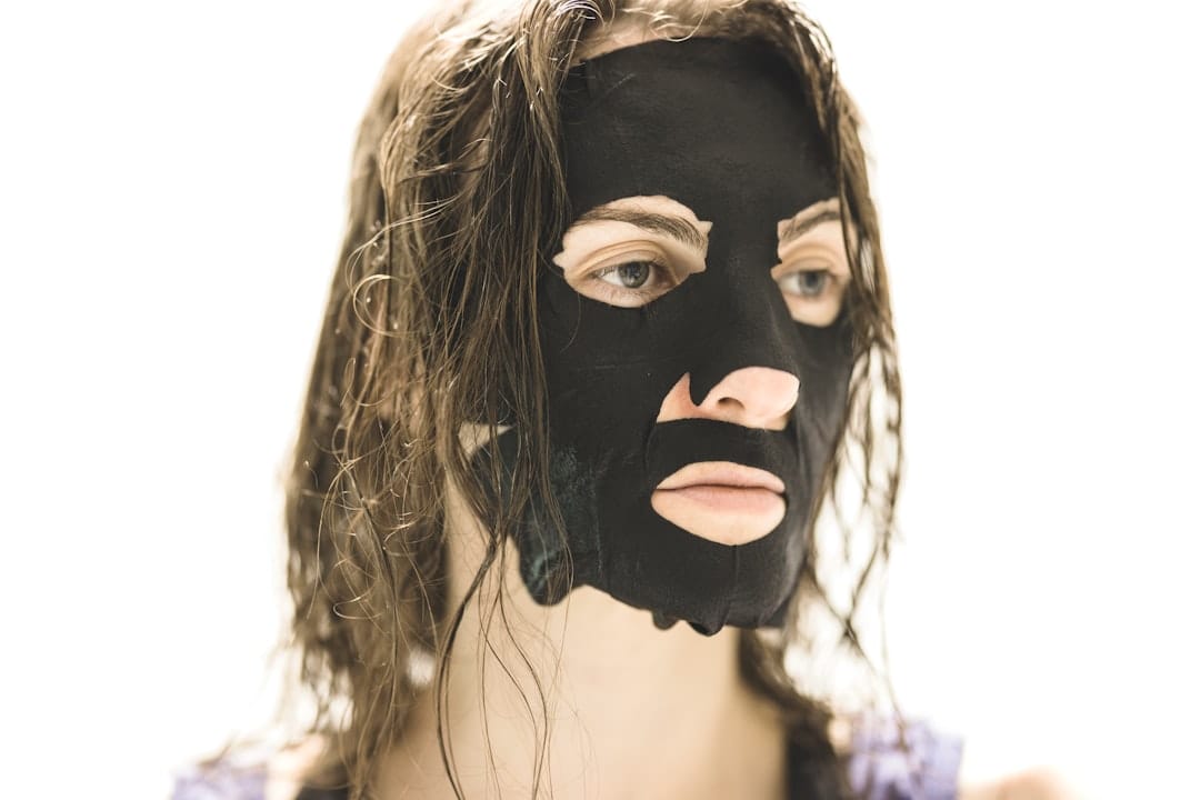 woman applying face mask
