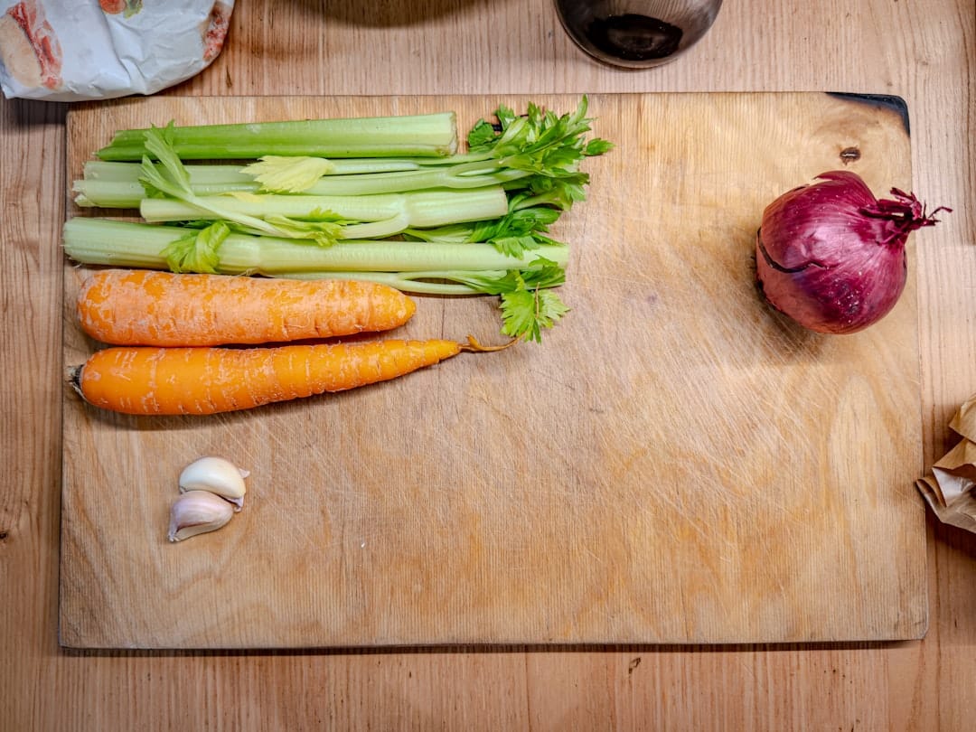 fresh celery stalks cutting board